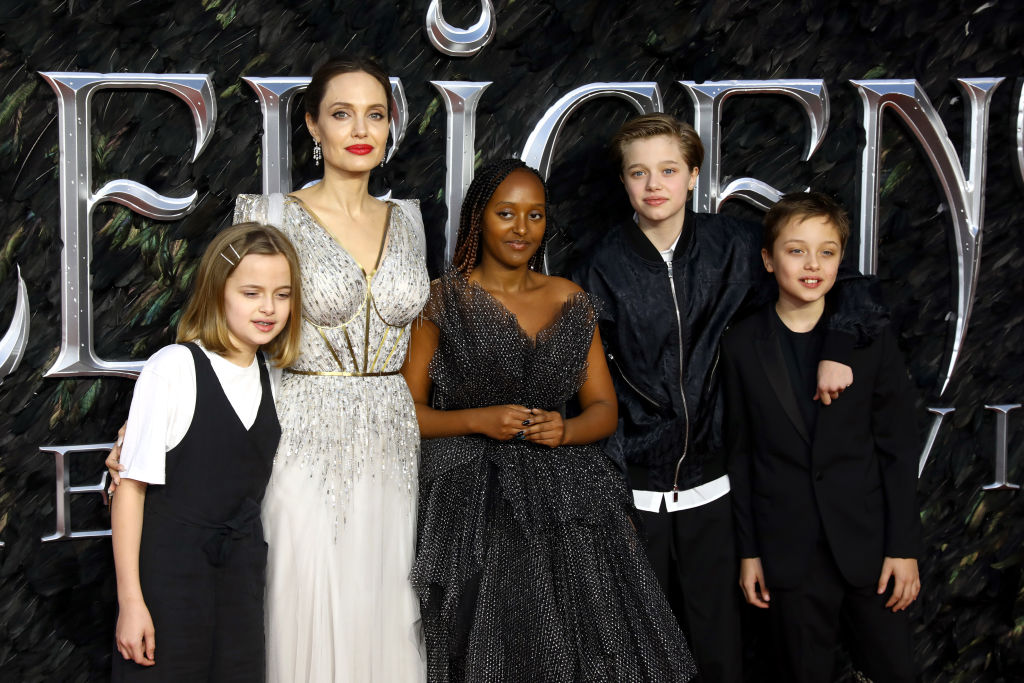 LONDON, ENGLAND - OCTOBER 09: (L-R) Vivienne Marcheline Jolie-Pitt, Angelina Jolie, Zahara Marley Jolie-Pitt, Shiloh Nouvel Jolie-Pitt and Knox Jolie-Pitt attend the European premiere of 
